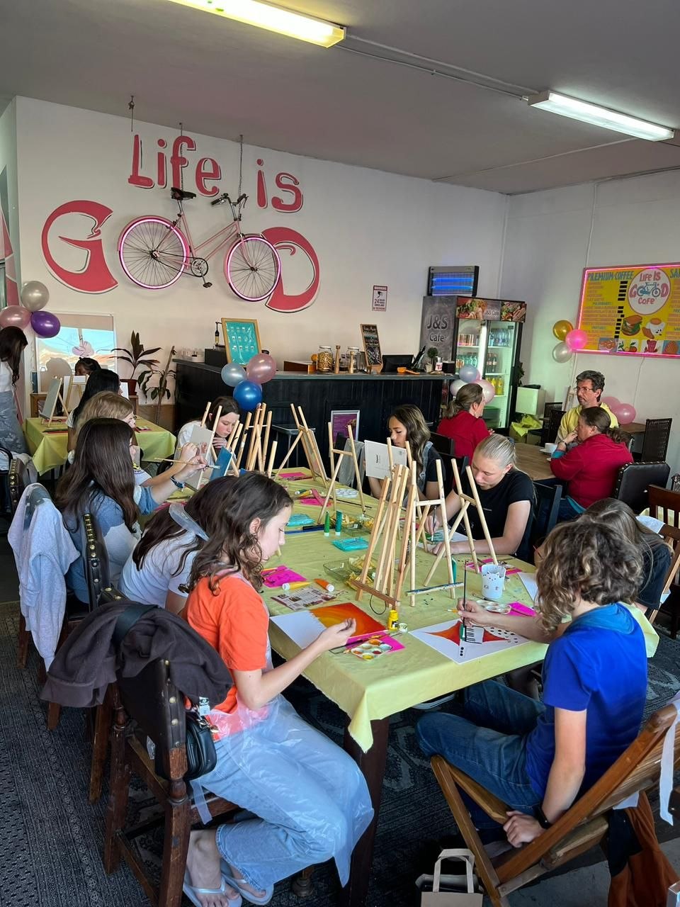 Large group creative session at Life Is Good Café